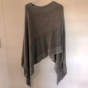 Various grey striped Shaw or poncho